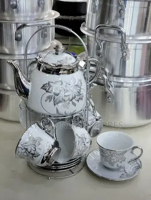 2 Sets of Coffee Teapots I.E5 Cups,5saucers,1 Teapot,A Rack