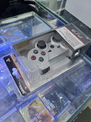 A Dual Shock Ps3 Silver Controller