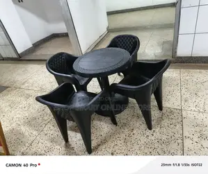 4plastic Chairs and Table