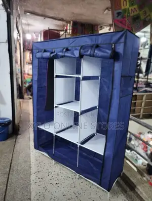 Portable 3 Column Clothe Frame Wardrobe Blue Color