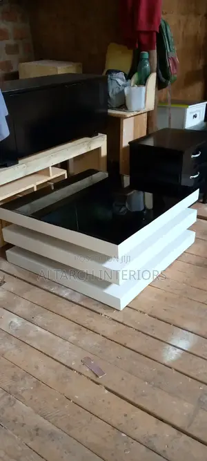 Black and White Square Centre Table With a Glass on Top