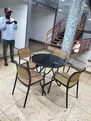 Dining Glass Table and Plastic Chairs