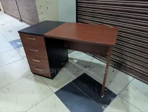 Second and 4 Drawered Office Desk With a Central Lock Key