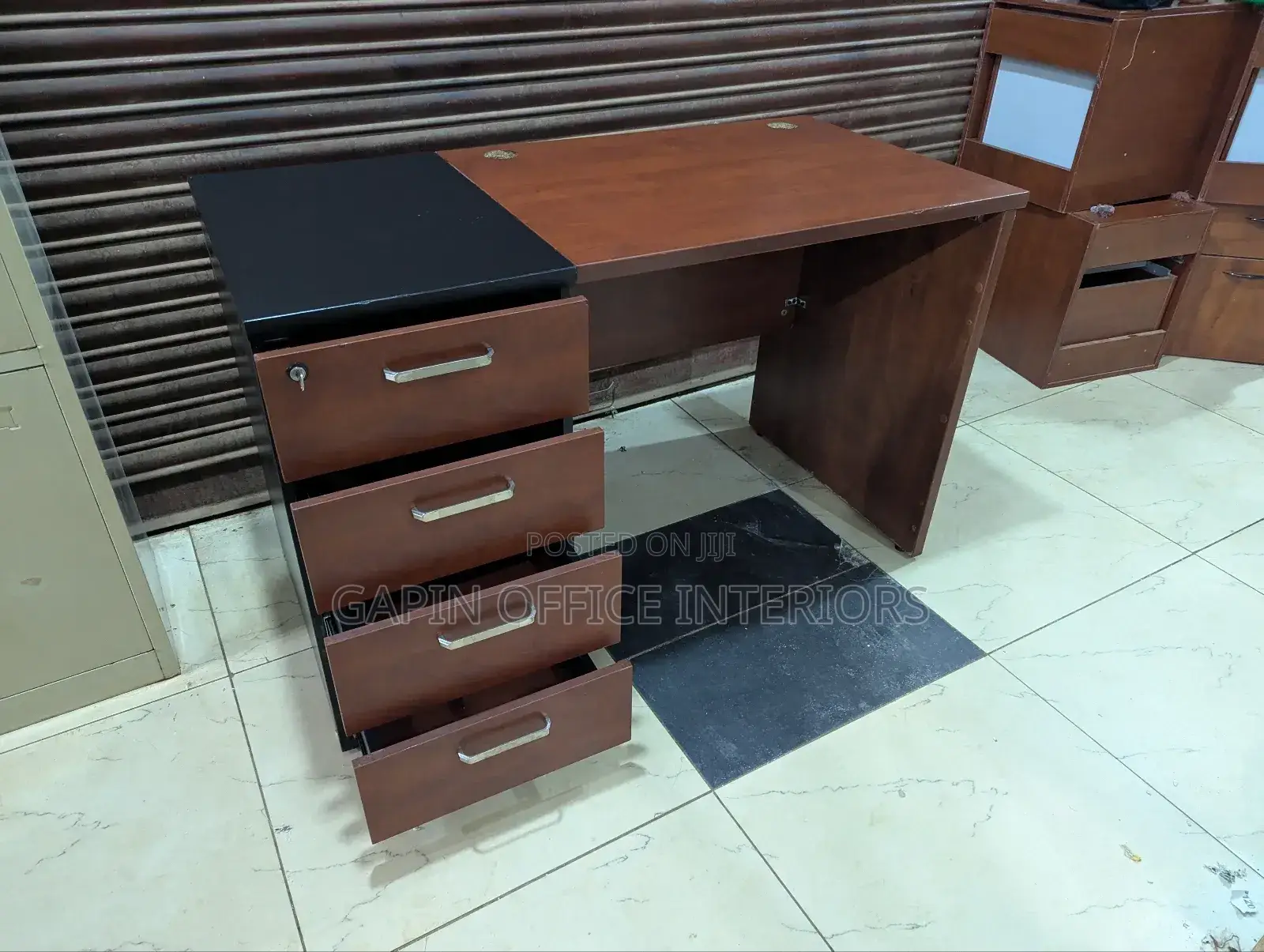 Second and 4 Drawered Office Desk With a Central Lock Key