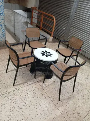 Black Outdoor Plastic Chairs and Table