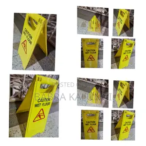 Yellow, Foldable "Caution Wet Floor" Sign.