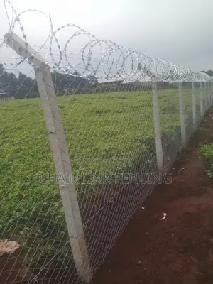 Chain Link Fence Razor Wire Installation.