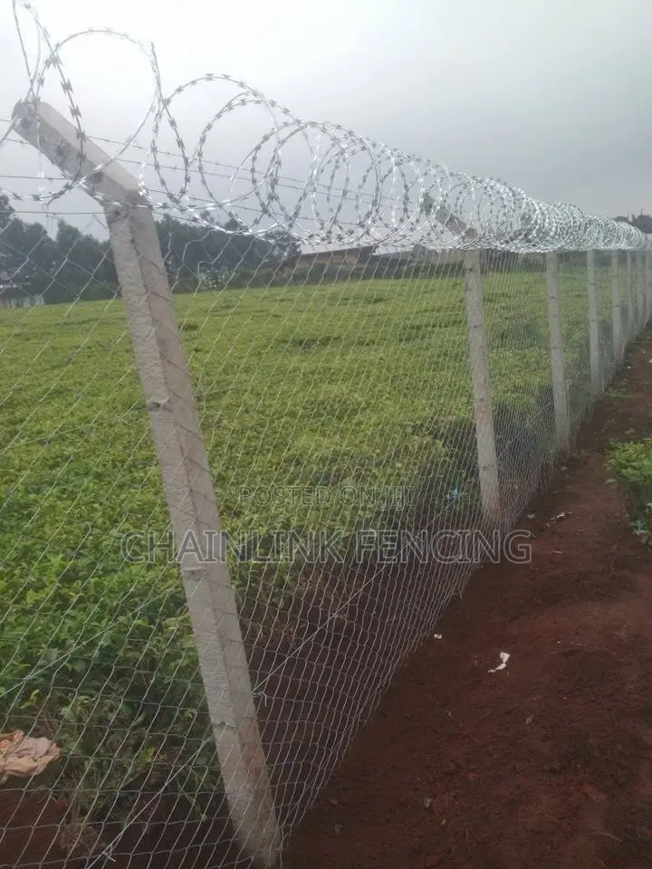 Chain Link Fence Razor Wire Installation.