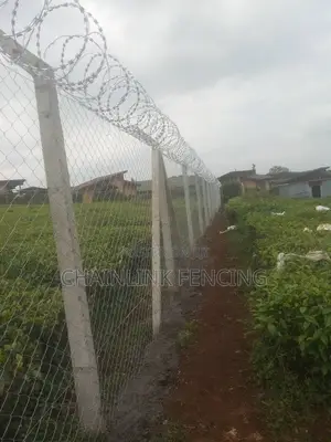 Chain Link Fence Razor Wire Installation.