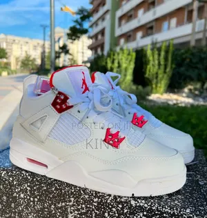 Metallic Red White Jordan 4s