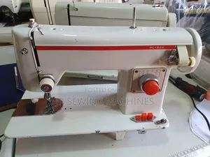 White Mitsubish Straight Sewing Machine