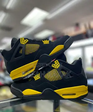 Black/Yellow Air Jordan 4 Retro “Thunder Yellow” Sneakers