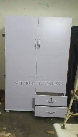 Simple White Closet With 2 Drawers and 2 Doors