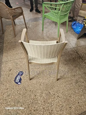 Plastic Chairs With Arm Rest.