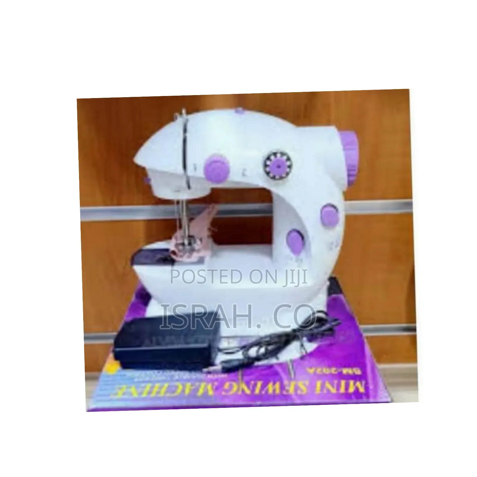 Mini Electric Sewing Machine.