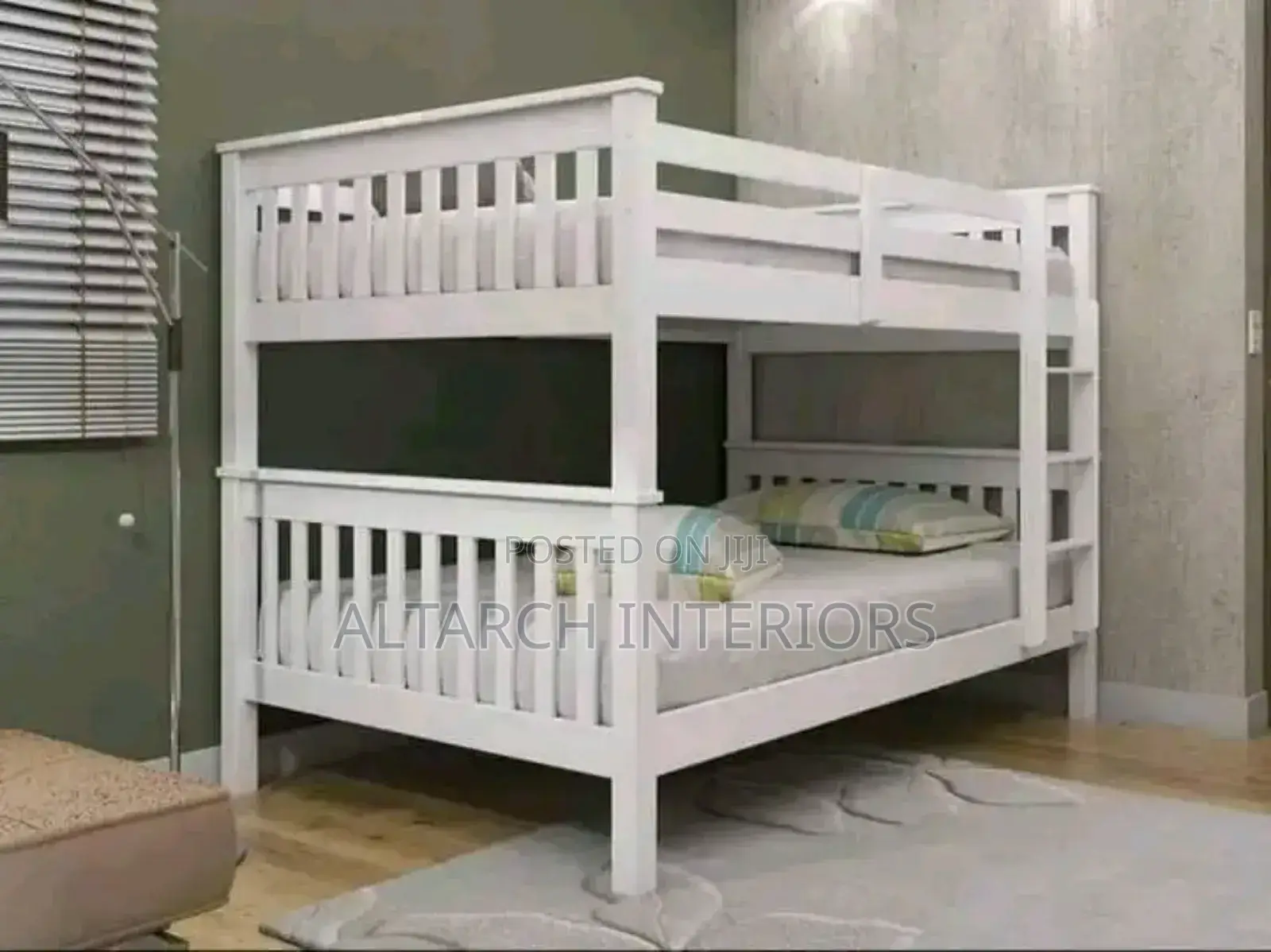 White Double Decker With Guards and Stepping Ladder