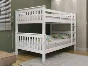 White Double Decker With Guards and Stepping Ladder