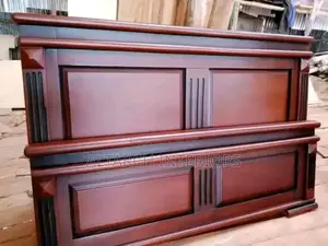 Plain Wooden 5by 6 Queen Bed Well Finished in Dark Mahogany