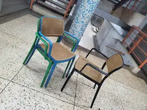 Worldly Armed Plastic Chairs Worldly Armed Plastic Chairs