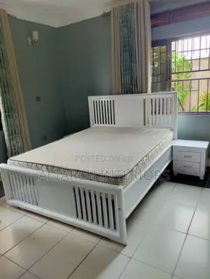 5by 6 White Bed in a Unique Design With a Bedside Drawer