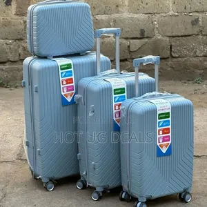 4 Pieces Set Of Waterproof Rubber Travel Suitcases- Vary