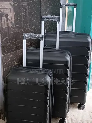 3 Pieces Set Of Waterproof Rubber Travel Suitcases- Vary