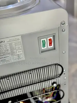SPJ Hot Cold Water Dispenserwith a Storage Cabinet.