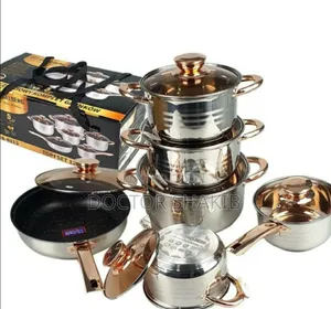 New Stainless Steel Cookware With Gold-Accented Glass Lids.