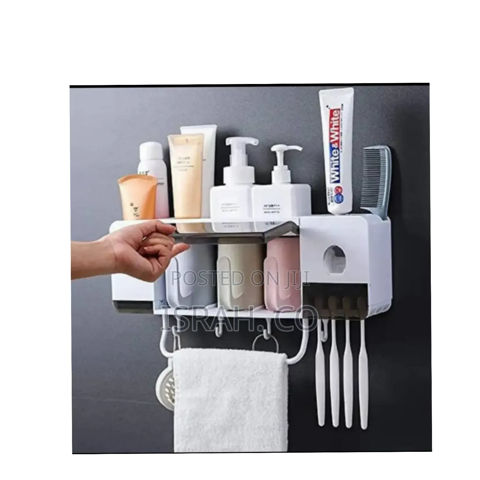 Toothpaste Dispenser and Toothbrush Holder.