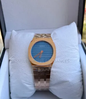 Beeyi Dodolo on Unisex Gucci Wrist Analog Time Piece