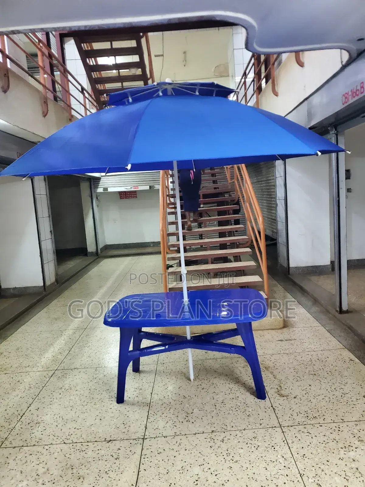 Bar Table and Umbrella Blue Color