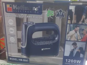 Hoffman's Hand Held Steam Iron