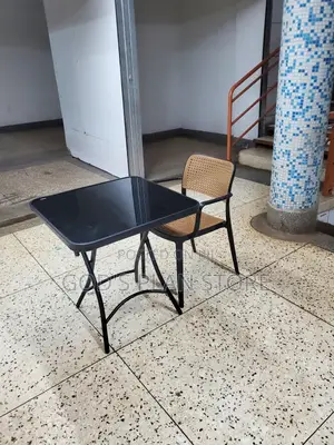 Ratten Plastic Chair and Foldable Glass Table