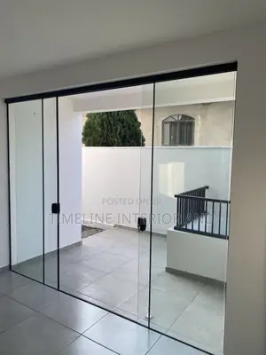 Frameless Aluminium and Glass Balcony Door