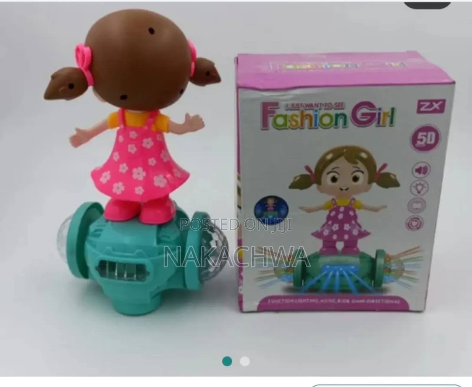 Plastic Pink Musical Dancing Spinning Doll