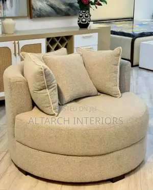 Single Round Sofa With Soft Pillows and Seats