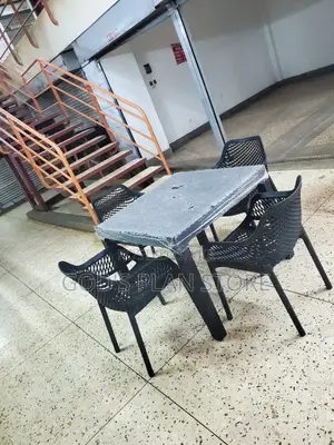 4 Seater Plastic Table and Egypt Armed Chairs Plastic
