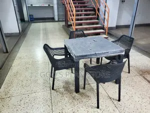 4 Seater Plastic Table and Egypt Armed Chairs Plastic