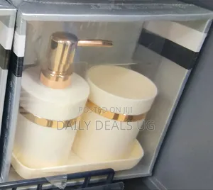 A Soap Dispenser and a Toothbrush Holder