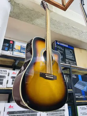 Good Strings Powered Acoustic Guitar