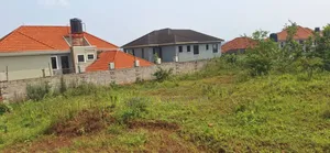 Buwate Najjera Plot for Sale Road at 235m . It's 25 Decimals