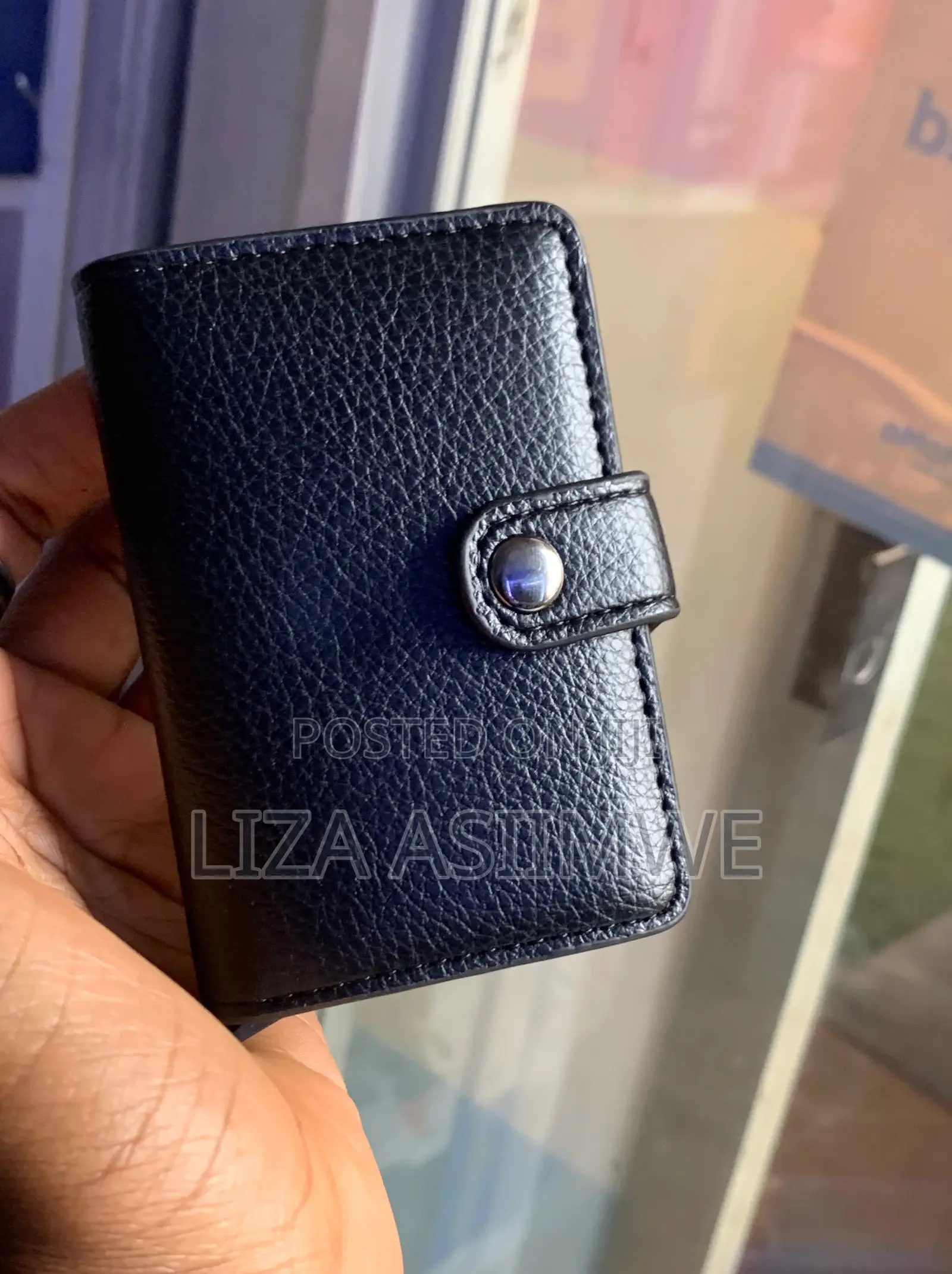 Compact Leather Cardholder or Wallet With a Snap Closure