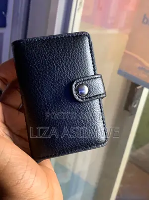 Compact Leather Cardholder or Wallet With a Snap Closure
