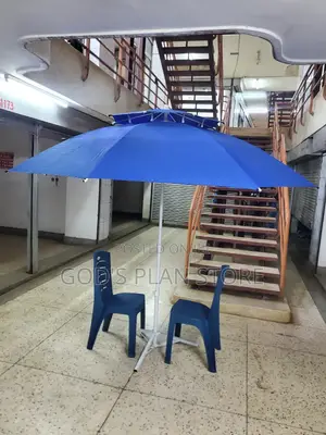 Outdoor Restaurant and Bar Umbrellas With Two Chairs