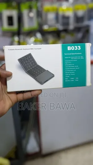 B033 Mini Foldable Bluetooth Keyboard With Touchpad.