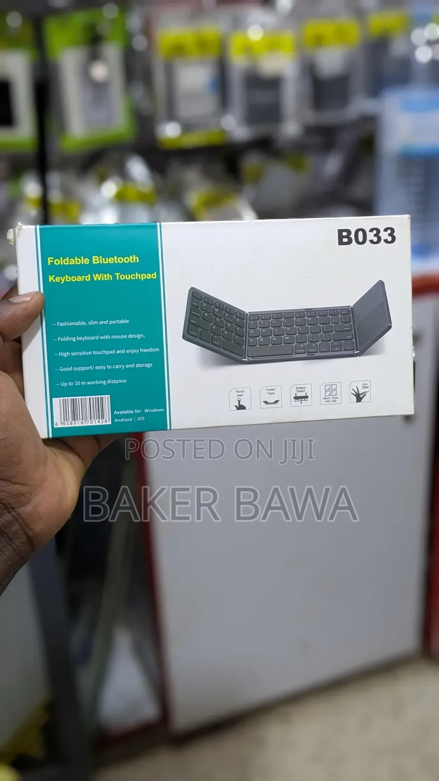 B033 Mini Foldable Bluetooth Keyboard With Touchpad.