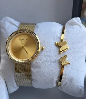 Golden Calvin Klein Women's Wrist Analog Time Piece With a Bracelet