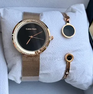 Calvin Klein Women's Rose Golden Wrist Time Piece With a Bracelet