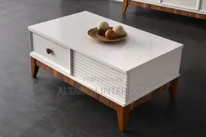 Simple and Unique White Centre Table With Brown Legs