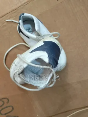 Used Size 24 White Naturino Shoe